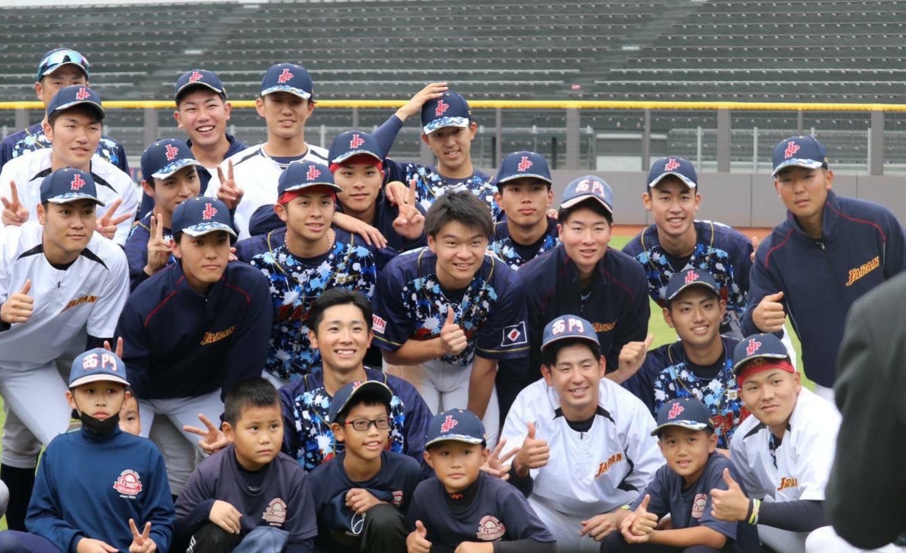 現地の子どもたちと野球教室を開催