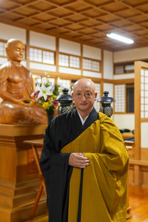 久間 泰弘