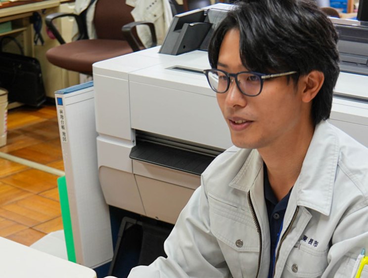 飯田達也さん